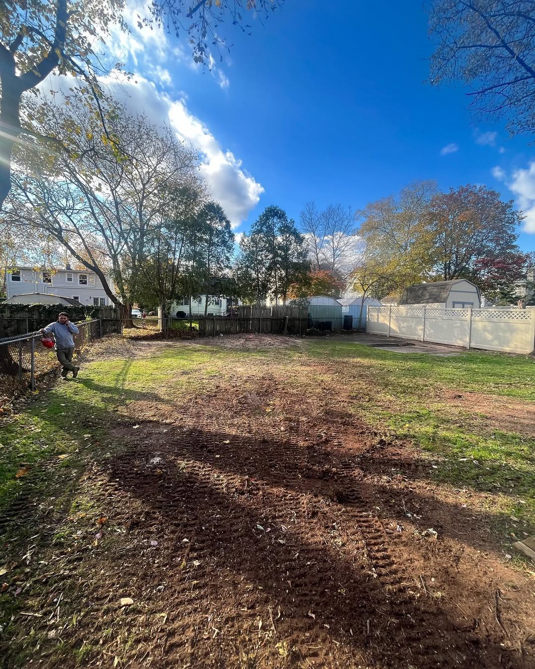 Freshly cleared backyard after land clearing and tree removal in Somerville NJ